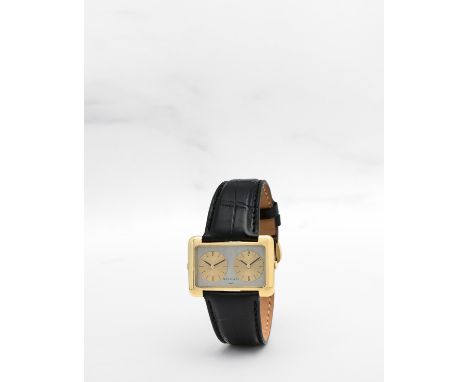 BULGARI. RARE MONTRE BRACELET EN OR JAUNE 18K (750) DE FORME RECTANGULAIRE DUAL TIME MOUVEMENT MECANIQUE BULGARI. A RARE 18K 