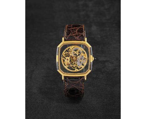 GIRARD PERREGAUX. MONTRE BRACELET EN OR JAUNE 18K (750) ET ONYX DE FORME OCTOGONALE ET CADRAN SQUELETTE MOUVEMENT MECANIQUEGI