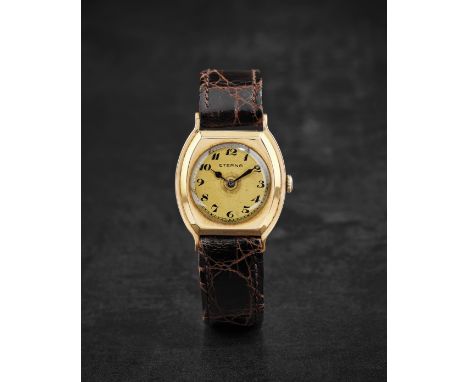 ETERNA. RARE MONTRE BRACELET EN OR 14K (585) DE FORME TONNEAU MOUVEMENT MECANIQUEETERNA. AN UNUSUAL 14K GOLD MANUAL WIND TONN