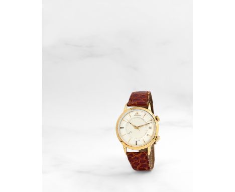 JAEGER-LECOULTRE. MONTRE BRACELET EN OR JAUNE 18K (750) AVEC DATE ET ALARME MOUVEMENT AUTOMATIQUE JAEGER-LECOULTRE. AN 18K GO