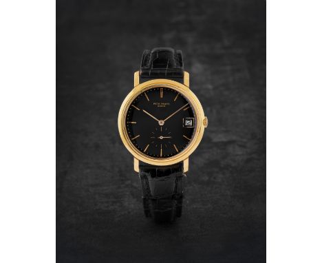 PATEK PHILIPPE. BELLE MONTRE BRACELET EN OR JAUNE 18K (750) AVEC DATE ET CADRAN NOIR LAQUE MOUVEMENT AUTOMATIQUEPATEK PHILIPP