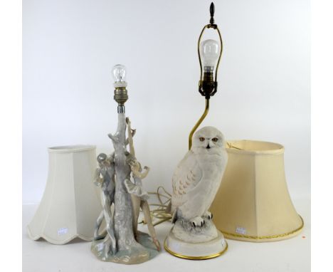 A Franklin Mint figural table lamp 'Snowy Owl' and a Lladro table lamp of a Pierrot and ballet dancer. (2)