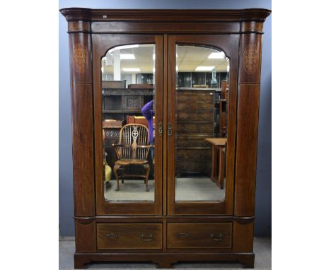 Mahogany line and marquetry inlaid wardrobe with mirrored doors, drawers on bracket feet,