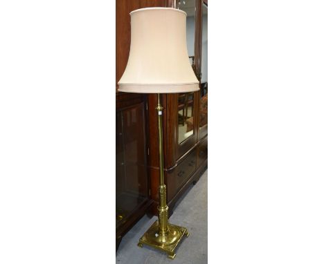  Brass adjustable  lamp stand on square platform base with rosette decoration.