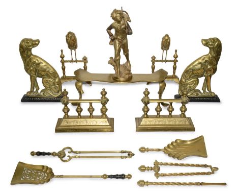 A collection of brass fire andirons, dogs and tools,early 20th century, to include a pair modelled as spaniels, another with 