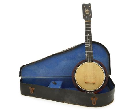 A banjo ukelele 'banjolele', by Keech,serial number 1525, one piece neck, aluminium resonator ring, hide skin, shield-shape m