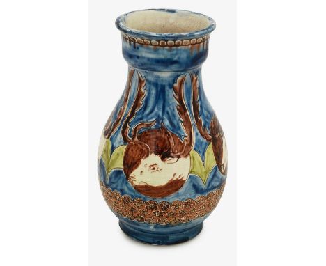 A Della Robbia pottery vaseearly 20th century, of baluster form, decorated by Charles Collis, with stags, above a floral band