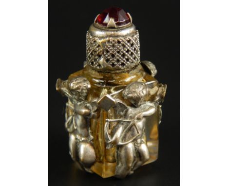 A Continental glass and silver plated miniature scent bottle, from the late 19thC decorated with putti, the lid inset with a 
