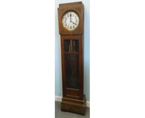 An Art Deco style oak longcase clock, with silvered dial, 180cm high.
