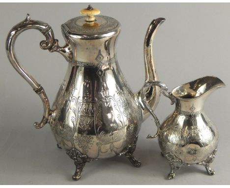 An early 20thC silver plated coffee pot and jug, each heavily embossed, with a bulbous shaped outline and shaped leaf capped 