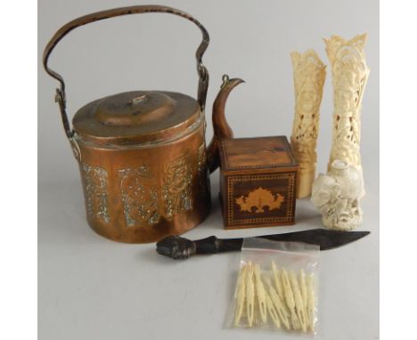 Miscellaneous ethnographica, to include a pair of carved bone vases, an embossed kettle, etc. 