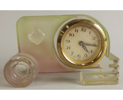 An Art Deco style mantel timepiece, modelled in the form of a vintage car or tractor, the movement stamped made in Germany, 1