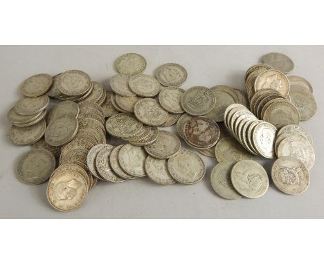 A quantity of early 20thC silver shillings, etc.