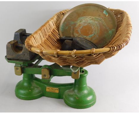 A set of Todd's scales, with large basket and various iron weights.