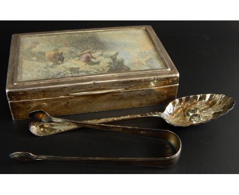 A collection of silver, to include a cigarette box, the lid inset with a hunting scene, a pair of 19thC sugar tongs and a ber