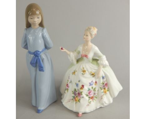 Two ceramic figures, a Royal Doulton figure of Diana and a Nao figure of a young girl wearing a blue dress.