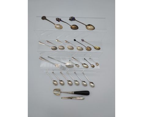 A Large selection of silver hall marked tea spoons, souvenir spoons, Mother of pearl fruit knife etc