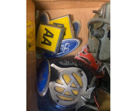 A Box of vintage car badges, clocks and gauges. Includes Smiths MPH Gauge, Sabre Amperes gauge and ford clock. 
