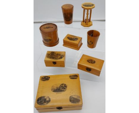 A Lot of 8 pieces of Mauchline ware to include Egg timer, money box, trinket boxes and shot glass holder. 