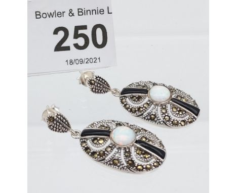 A pair of silver CZ &amp; opal paneled earrings 