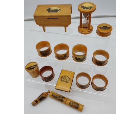 A Lot of 14 various Mauchline Ware items to include Napkin Rings, Needle holder, bank, egg timer and whistle. 