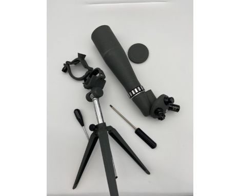 A Vintage scope with tripod stand. 