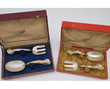 Two unusual boxed mother of pearl and shell made fork and Caviar spoon sets. 