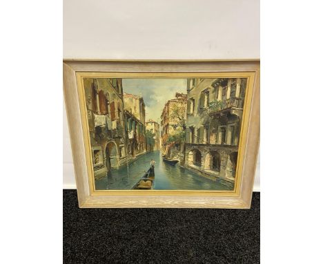 A Vintage oil painting on canvas depicting a Venice canal scene. Signed by the artist. [Frame measures 78x92cm] 