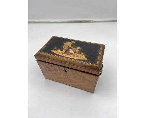 A 19th century two section foil lined tea caddy. Detailed with brass handle mounts and Farmer figure marquetry [14x19x11cm] 