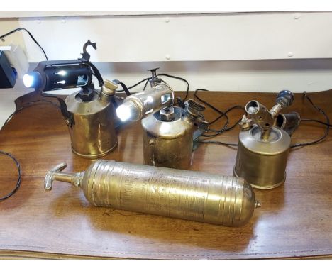 A Vintage brass fire extinguisher together with three vintage brass hand held burners converted into lamps. 