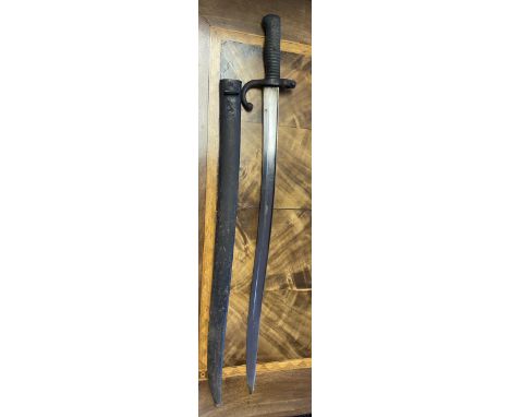 A French Military 1869 bayonet with scabbard. [68cm in length] 