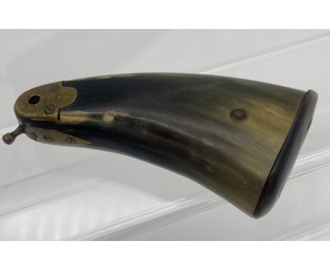 An 18th/ 19th century Horn and Brass mounted gun powder flask in the shape of a gun handle. [11cm in length] 