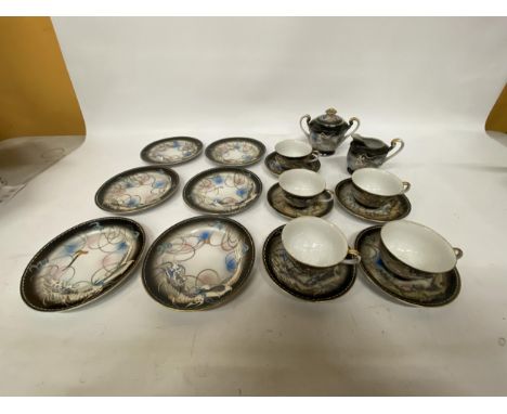A VINTAGE DECORATIVE JAPANESE MORIAGE DRAGON WARE EIGHTEEN PIECE TEASET