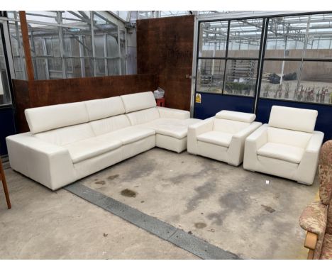 AN ITALIAN WHITE LEATHER THREE PIECE SUITE COMPRISING OF A THREE SEATER CORNER SOFA WITH CHAISE AND TWO ARMCHAIRS WITH ADJUST