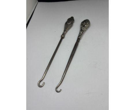 TWO MARKED SILVER TOPPED BUTTON HOOKS