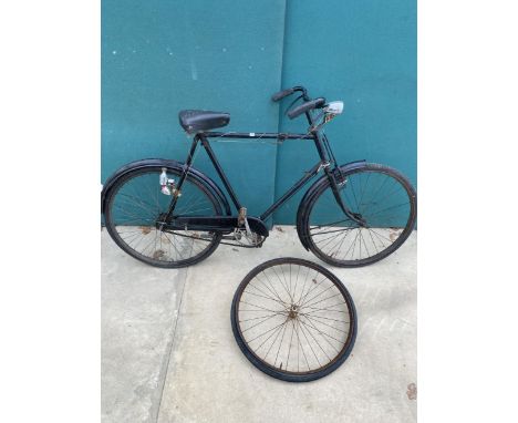 A VINTAGE GENTS BIKE WITH LEATHER SADDLE