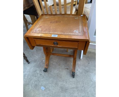 A SMALL YEW SOFA TABLE WITH LYRE ENDS
