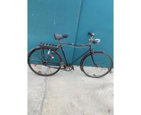 A VINTAGE GENTS BIKE WITH LEATHERIES SADDLE