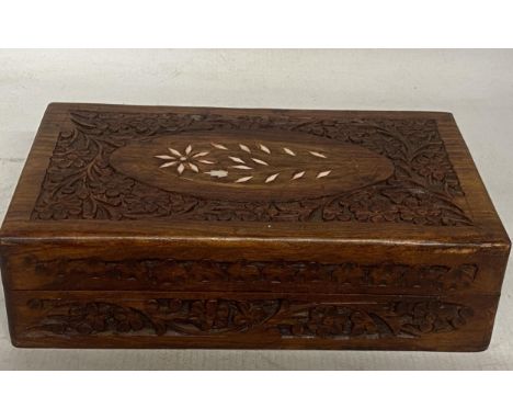 A VINTAGE INDIAN HARDWOOD INLAID BOX WITH CHISELED FLORAL DESIGN