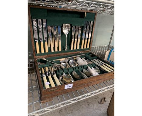 A VINTAGE OAK CASED BELIEVED COMPLETE CANTEEN OF B &amp; JS LTD CUTLERY
