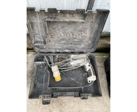 A MAKITA 110V SDS DRILL WITH CARRY CASE