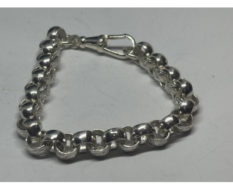 A MARKED SILVER ROLLER BALL BRACELET