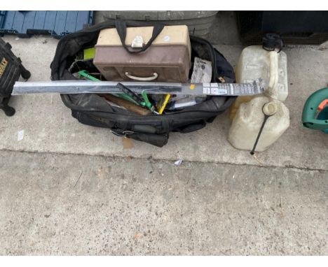 A TOOL BAG CONTAINING AN ASSORTMENT OF TOOLS TO INCLUDE A CAULK GUN AND A HAMMER ETC