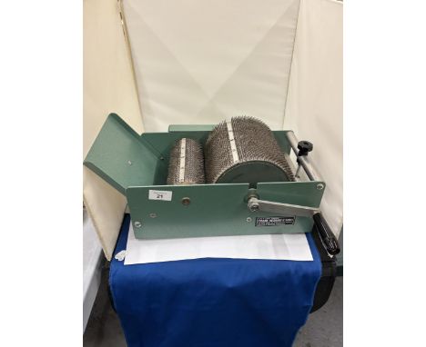 A VINTAGE FRANK HERRING AND SONS DRUM CARDING MACHINE
