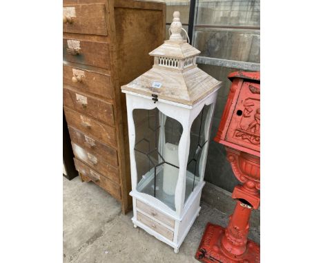 A LARGE DECORATIVE WOODEN CANDLE LANTERN WITH HINGED LID AND TWO DRAWERS TO BASE (H:120CM)