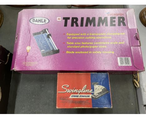 A BOXED 'SWORDFISH' PAPER TRIMMER PLUS A BOXED STAPLER