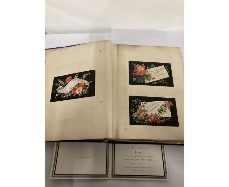 AN ALBUM CONTAINING A COLLECTION OF VINTAGE CARDS