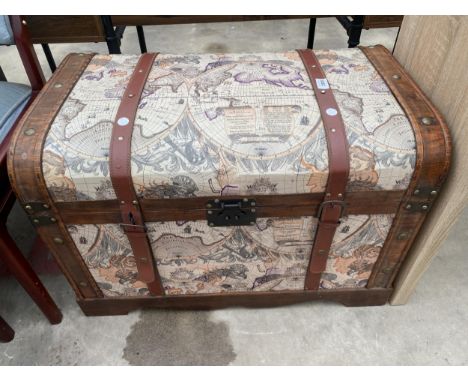 A REPRODUCTION DOME TOP TRAVELLING TRUNK