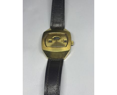 A SICURA JUMP HOUR GILT METAL CASED MULTI APERTURE  WRISTWATCH WITH DIALS FOR DATE, HOUR AND MINUTE AROUND A CENTRAL SECOND D