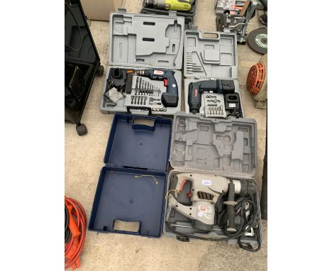 THREE CASED DRILLS TO INCLUDE A PRO ROTARY HAMMER DRILL AND TWO BATTERY POWERED DRILLS